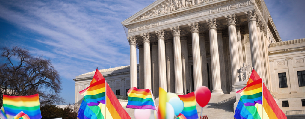 rainbow flags in front of U.S. Supreme Court building